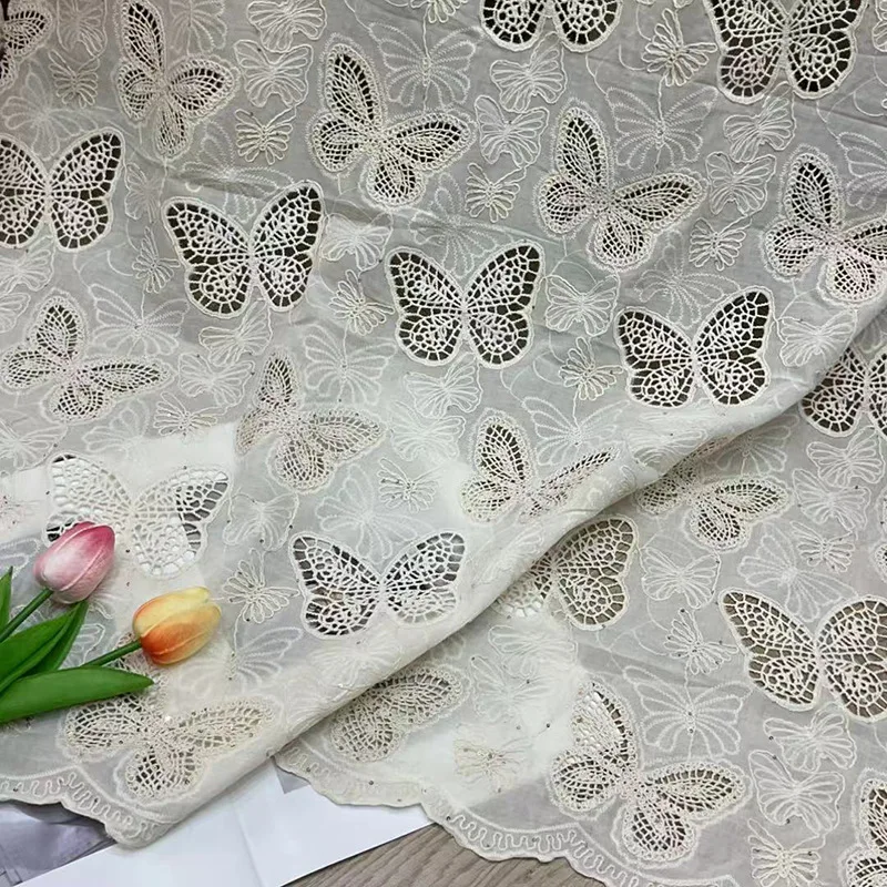 

New butterfly hollowed cotton rope embroidered sequin fabric 100% cotton laser water-soluble fabric for clothing