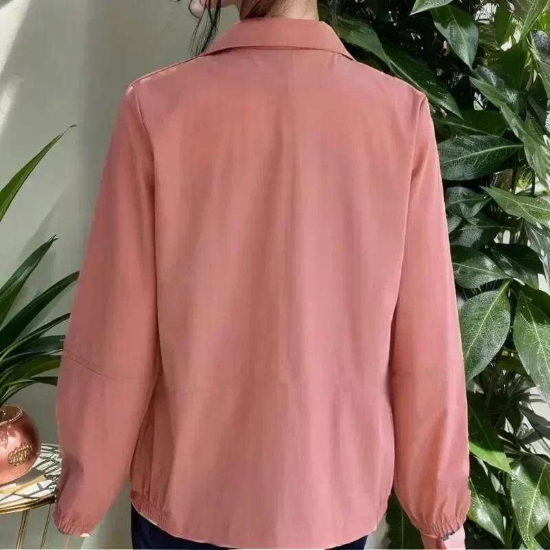 Abrigo holgado de manga larga para mujer, prenda de Color liso con cuello tipo Polo y bolsillos con cremallera, con cordones, a la moda, para otoño