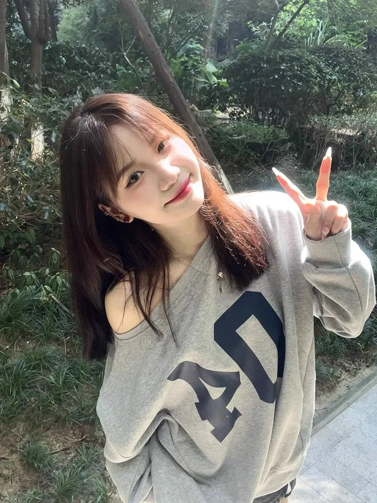 Jesienna nowa damska bluza w jednolitym kolorze, luźna moda uliczna, skośny kołnierzyk, z długim rękawem i nadrukiem dla kobiet