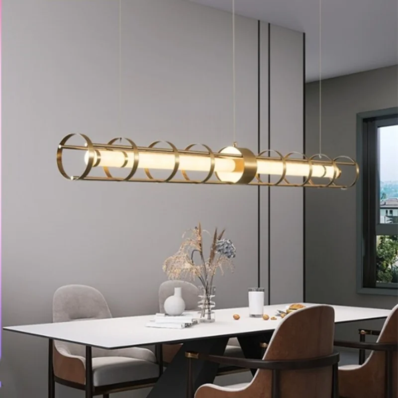 

Light luxury hollowed out restaurant pendant light simple modern dining table and bar desk lamp designer's creative strip light