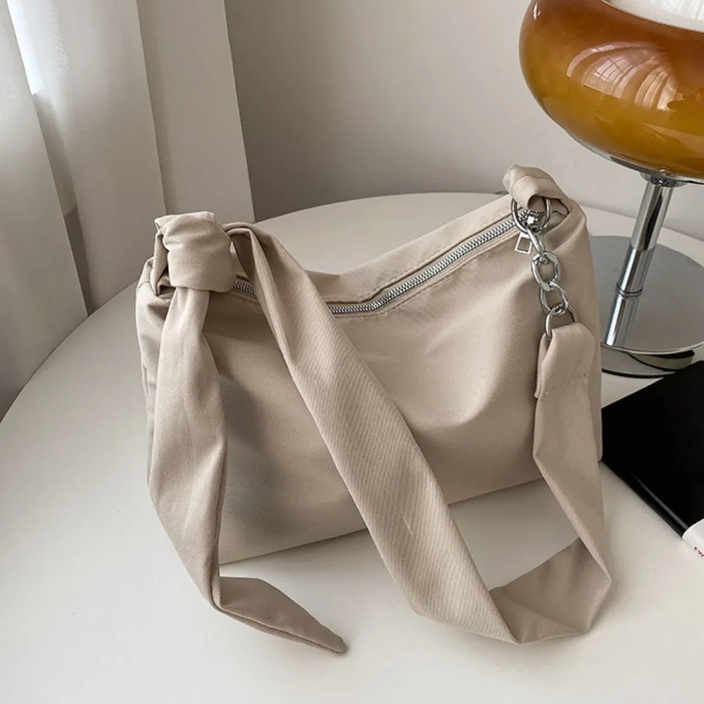 

Korean Style Solid Color Crossbody Bag Large Capacity Niche Design Light Soft Nylon Bag Knot Strap Tote Bag Shoulder Bag Travel