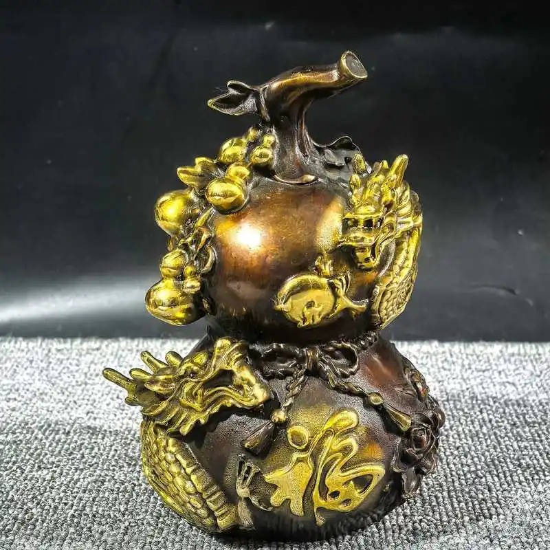 Gilt Bronze Fortune, Prosperity, and Longevity Gourd Ornament with Three-Dimensional Relief of Two Dragons Playing with a Pearl