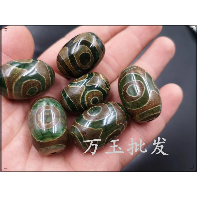 خرز عقيق Tianzhu ذو ثلاث عيون فضفاض