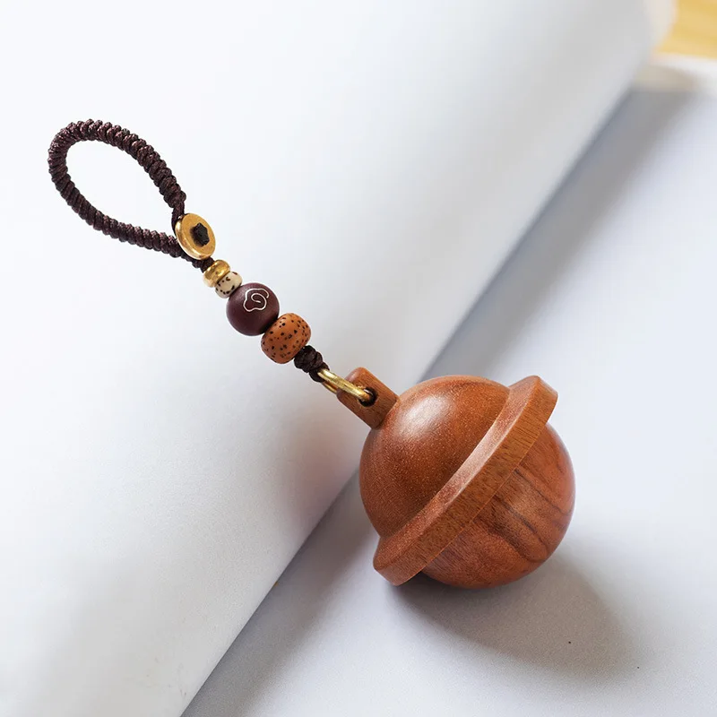 

Black Sandalwood :Dalbergia Cochinchinensis Keychain WIth Yellow Crystal Pendant Bell Key Chain Bag Phone Pendant Gift