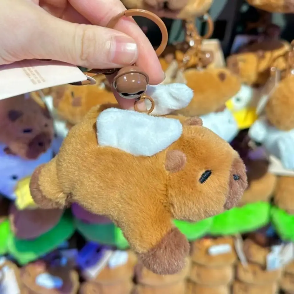 Neue Cartoon Plüsch Capybara Schlüssel bund mit Flügel Kuscheltiere Simulation Capybara Anhänger Soft Bag Zubehör Kinder