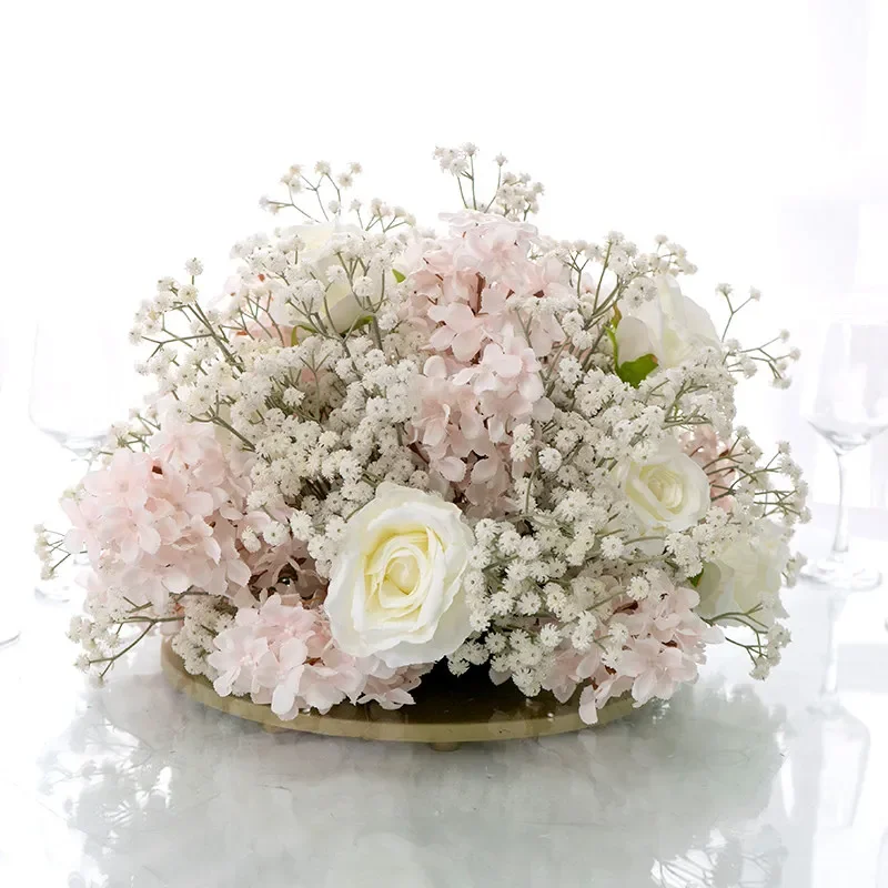 Hotel wedding banquet table with gypsy roses and table flowers, fake flower decoration