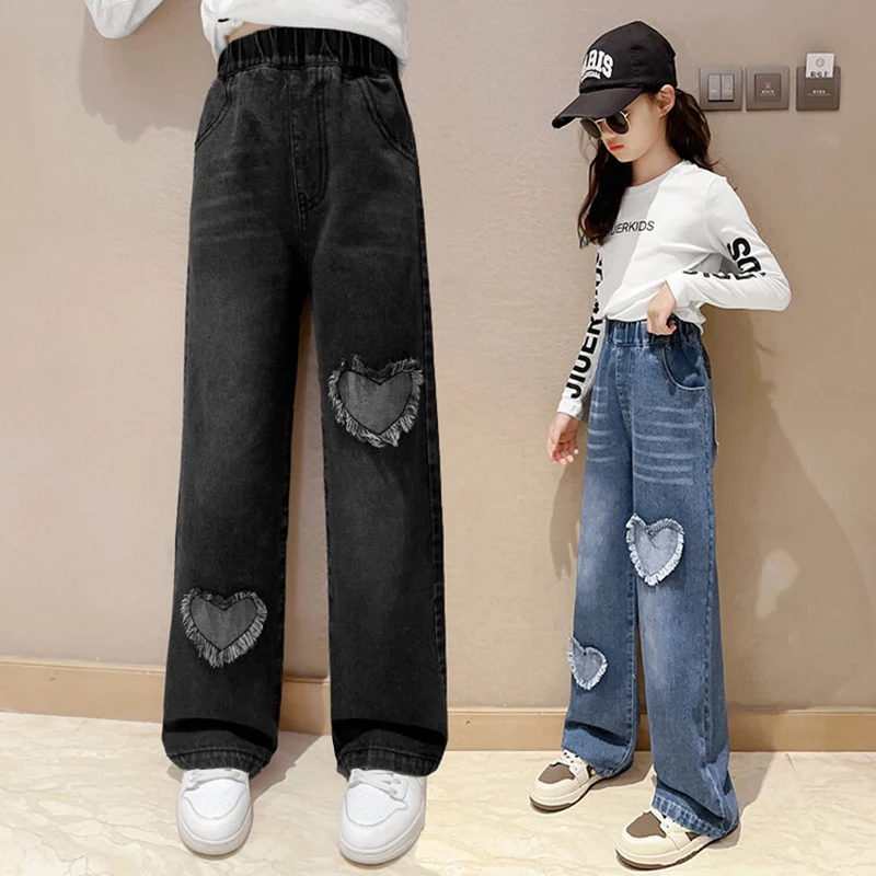 Celana panjang anak-anak celana kaki lebar Denim perempuan remaja Fashion baru celana Jeans anak perempuan pola cinta musim semi musim gugur pakaian anak-anak 5-14 tahun