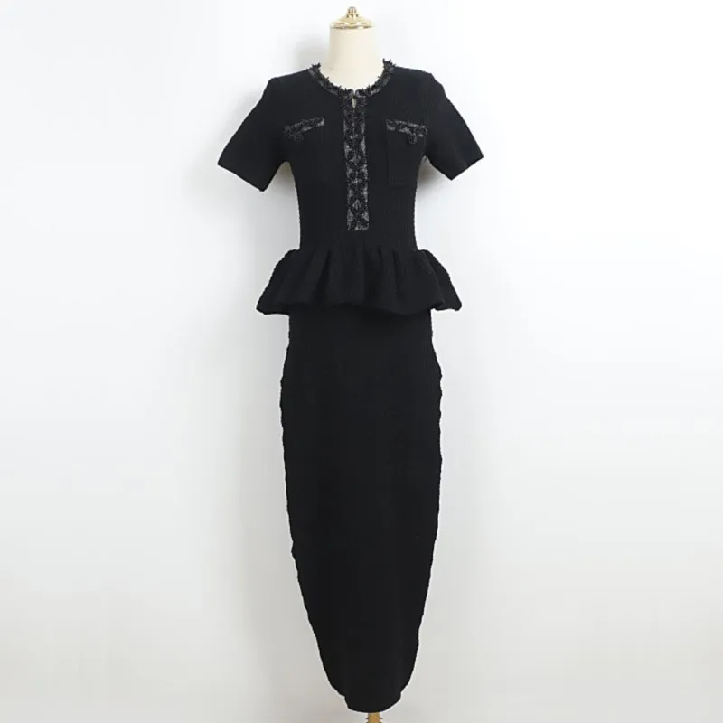   Vestido de punto elástico corto sin mangas 2025 Primavera/otoño/invierno vestido largo con borde de hoja de pescado vestido retro ceñido en la cintura