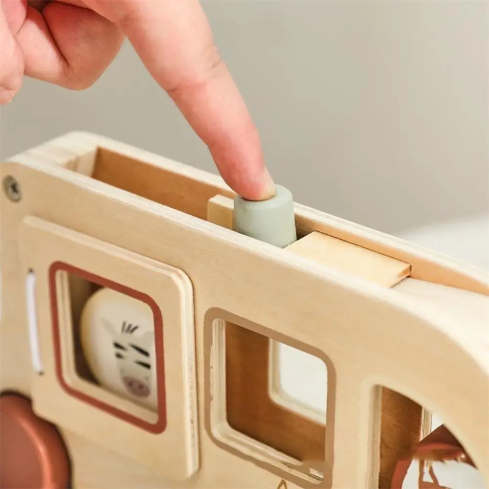 

Деревянный материал Деревянный автобус Игрушечные фигурки животных Цилиндрические блоки Ручной автомобиль Координация рук и глаз Мелкая моторика