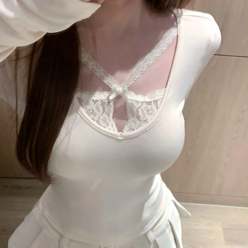 تي شيرت من الصوف الألماني ذو اللون الصلب مقترن بفتاة مثيرة بلون نقي ومربوط بأكمام طويلة لخريف وشتاء 2026 #5