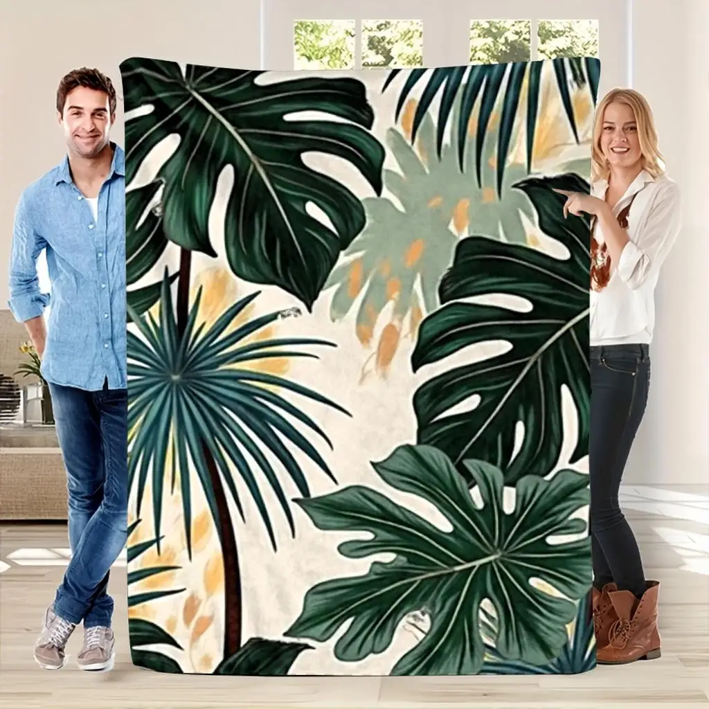 Tropical palm leaf and gold leaf patterned blanket, made of polyester, machine washable, suitable for bedrooms and living rooms