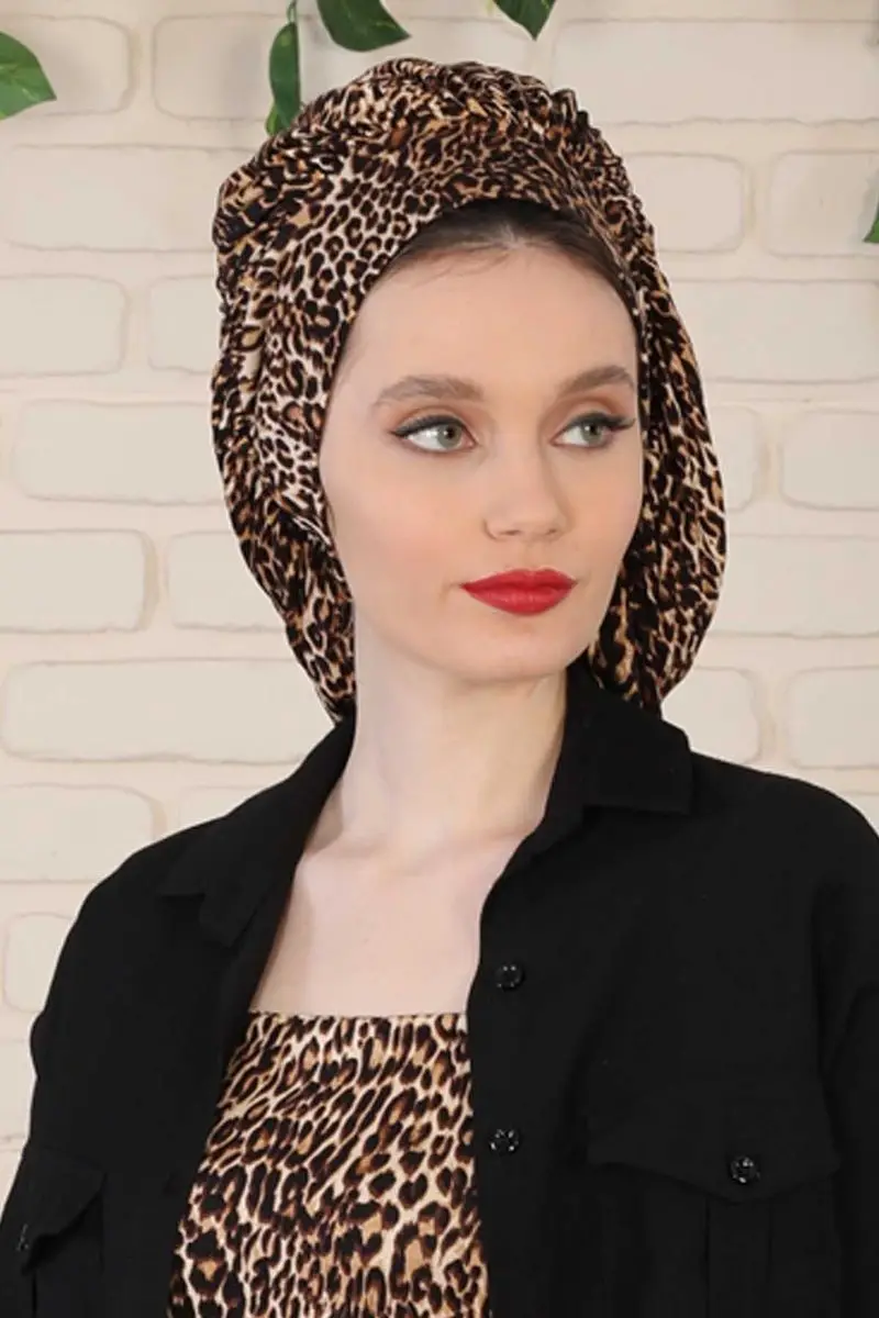 Motif léopard drapé, os peigné