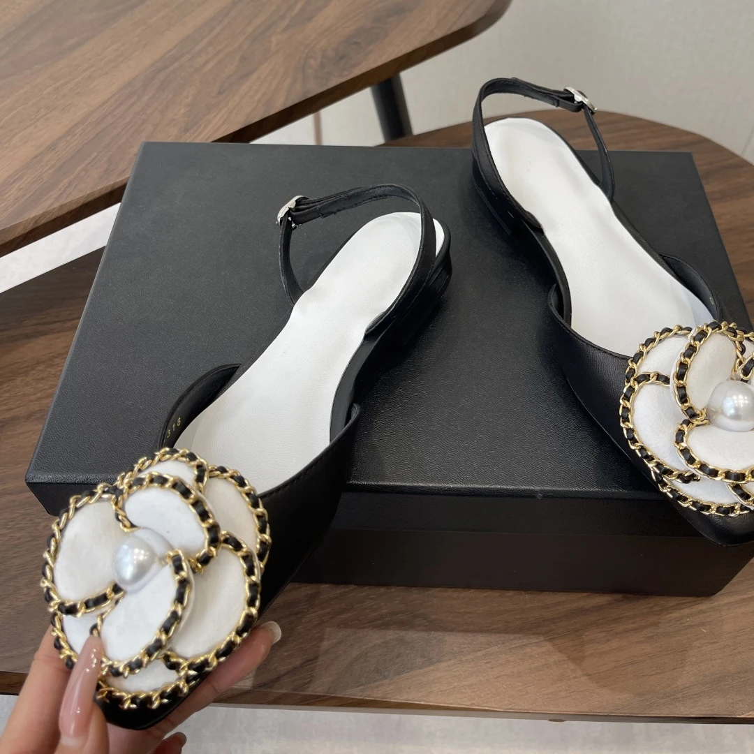 Women's Pearl-Embellished Flats real-life usage example in sophisticated office environment showing professional elegance