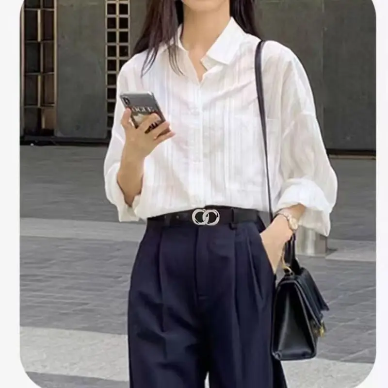 New double - loop chain buckle basic black glossy PU leather belt for women, a versatile waistband