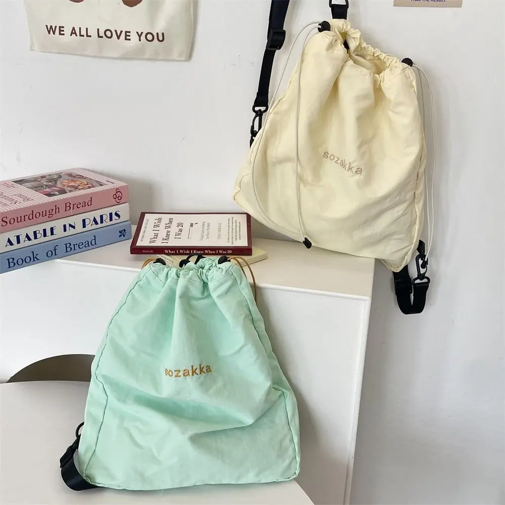 

Korean Style Nylon Drawstring Backpack Fresh Color Sweet Sport Nylon Bag Lightweight Harajuku Outdoor Travel Bag Travel