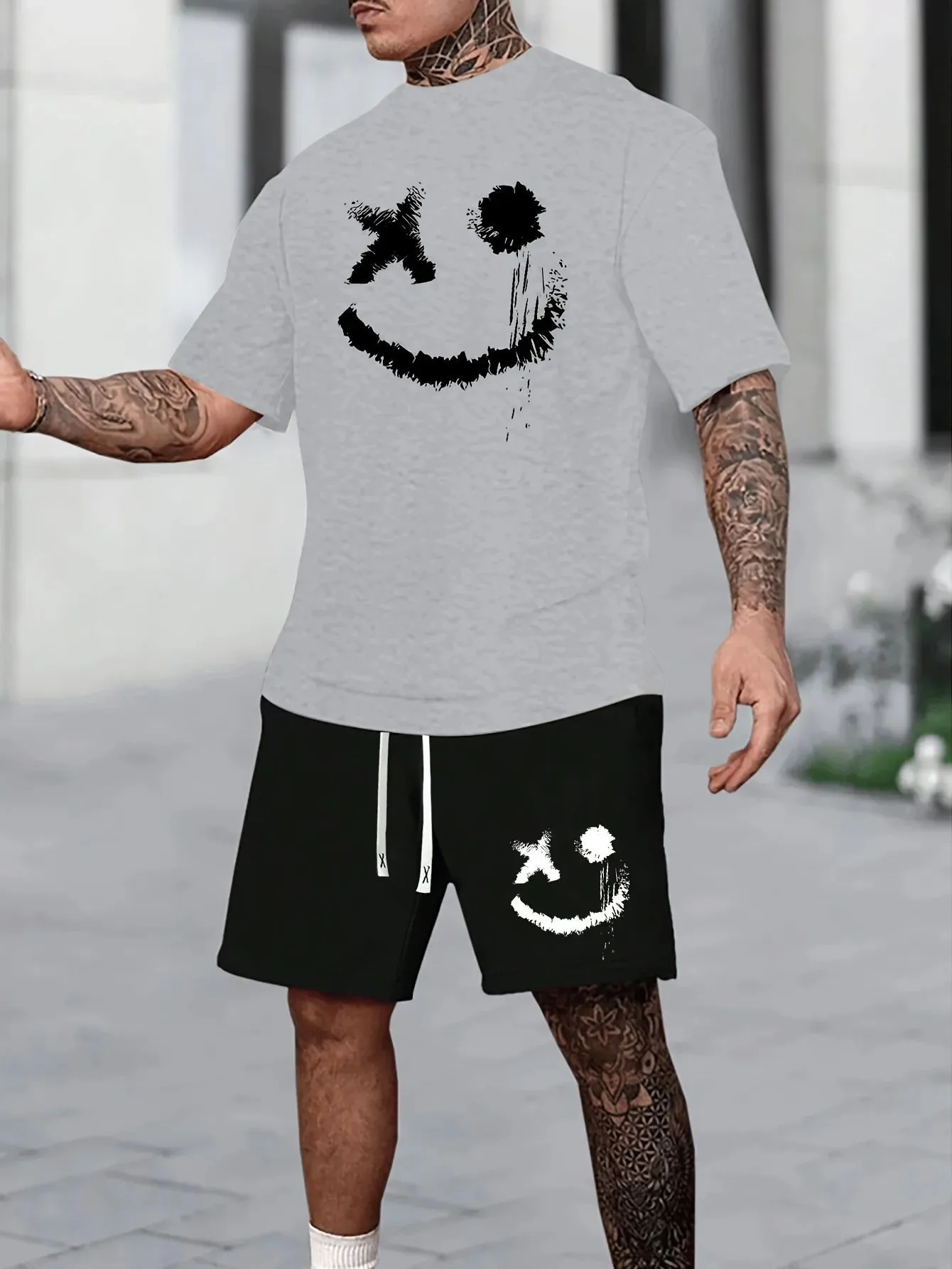 

A new 3D smiley face print casual sporty fashionable soft comfortable breathable and lightweight men's suit for summer 2025