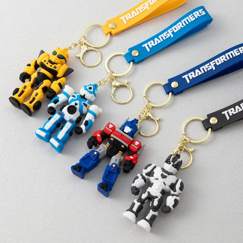 الكرتون فيلم محول مفتاح سلسلة أوبتيموس برايم نحلة روبوت سلسلة مفاتيح سيليكون سيارة مفتاح سلسلة حقيبة قلادة كيرينغ الأصدقاء