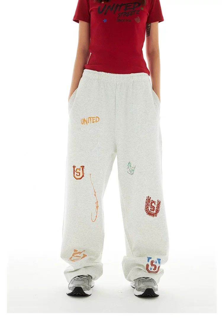 Americano retro graffiti casual cor sólida calças de perna reta para homens e mulheres high street jazz hip hop perna larga esportes