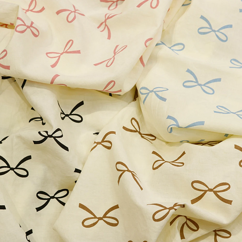 

NEW Bow Print Fabric For Handmade Dresses, Shirts, Pajamas, Home and Children's Clothing