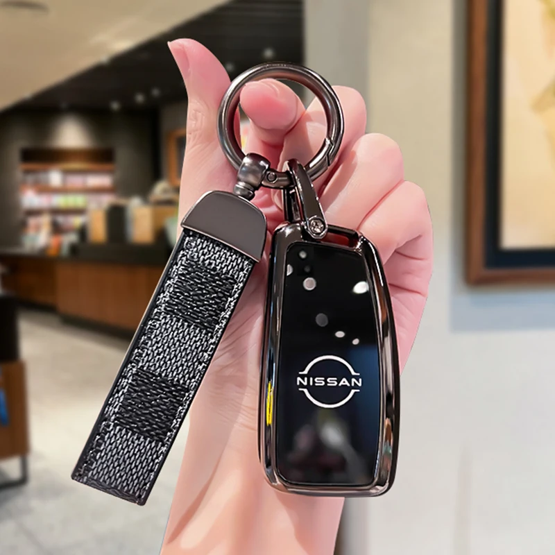 

Suitable for Dongfeng Nissan KICKS 2017 2018 2019 2020 2021 manual plug-in key shell zinc alloy car key bag car key cover
