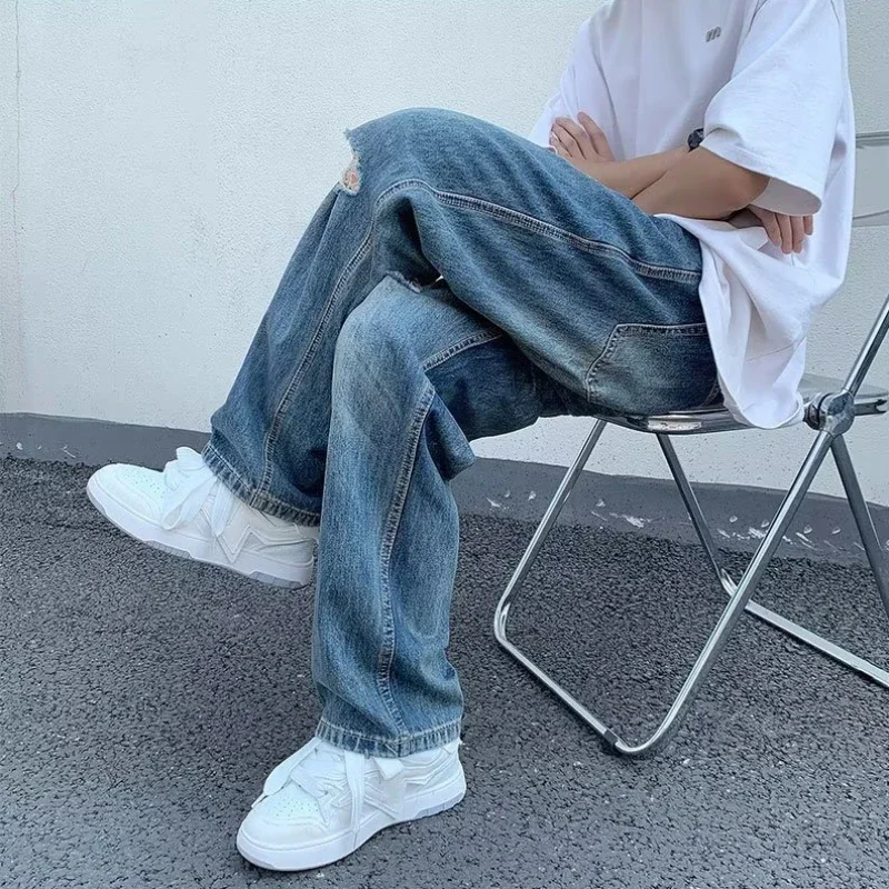 

Джинсы мужские с дырками осенние мешковатые универсальные шикарные корейские стильные ностальгические широкие джинсовые брюки High Street Prevalent Daily