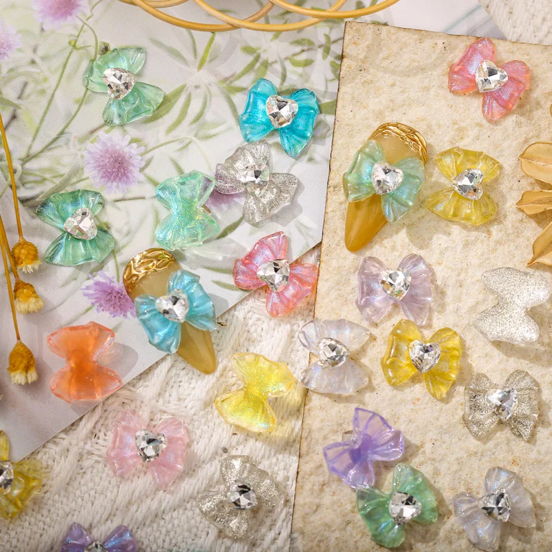 10 pz/lotto Ice Clear Nail Art Bow Charms Con Cuore Strass Gemma di Cristallo Trasparente Glitter Bowknot Unghie Decorazione Accessorio