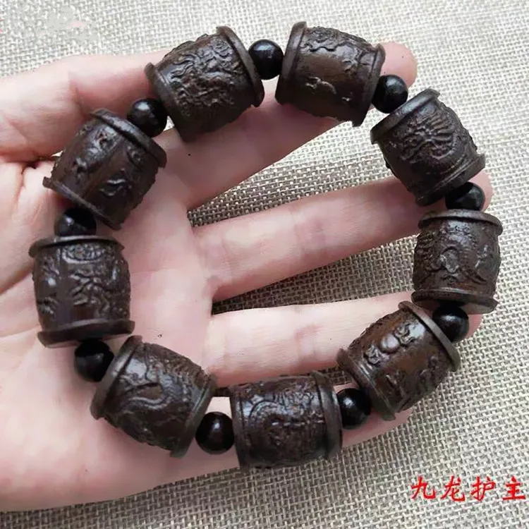 

Solid wood, ebony, agarwood, Buddha beads bracelet, Kowloon Ruyi bracelet, black leather wood carved bracelet