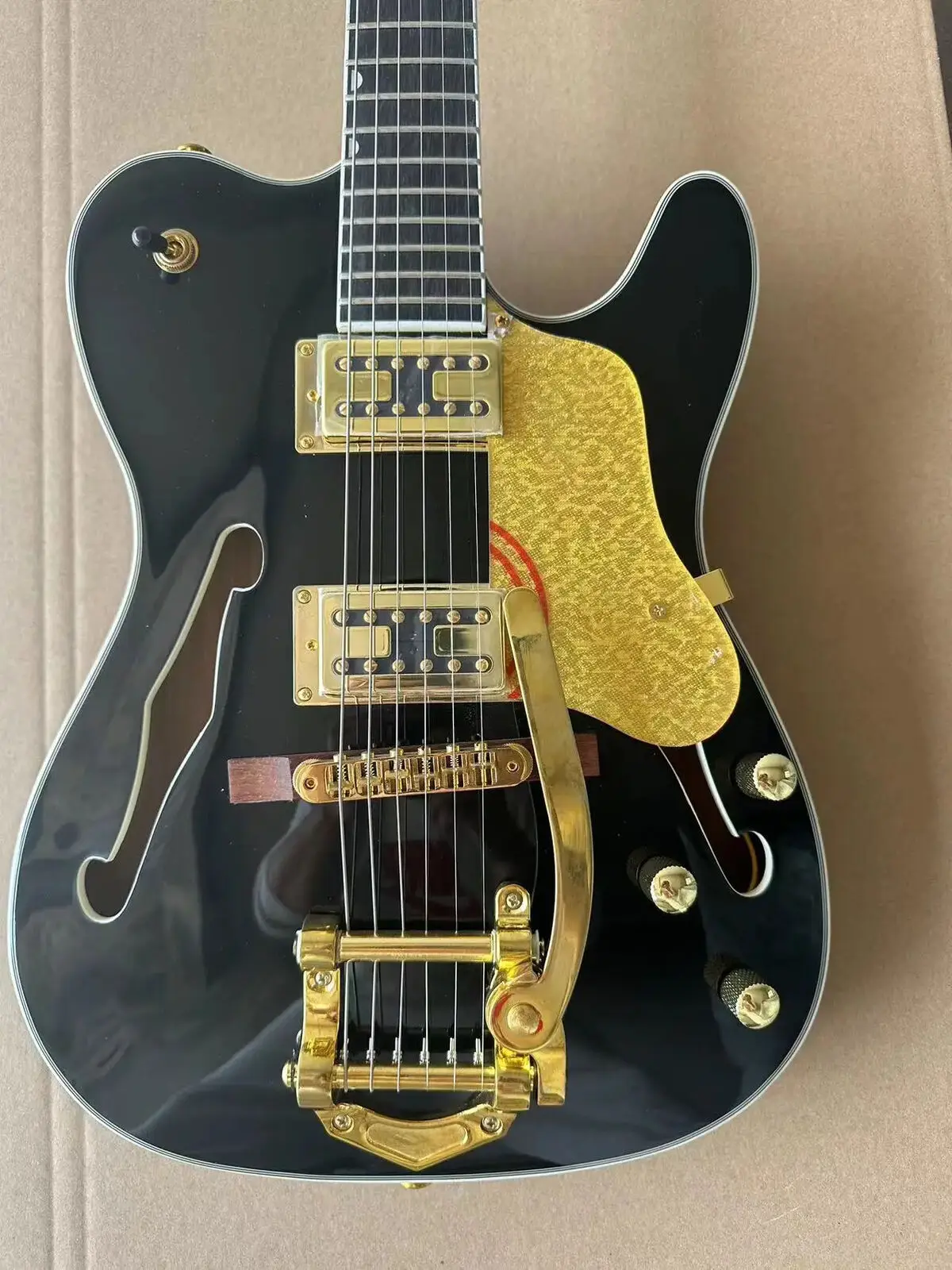 High quality electric guitar, mahogany fingerboard, jazz hollow body, maple top, black, gold accessories