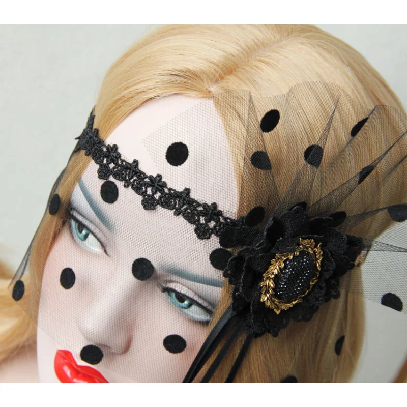 

Exaggerated fringed mask ball veil pole dance