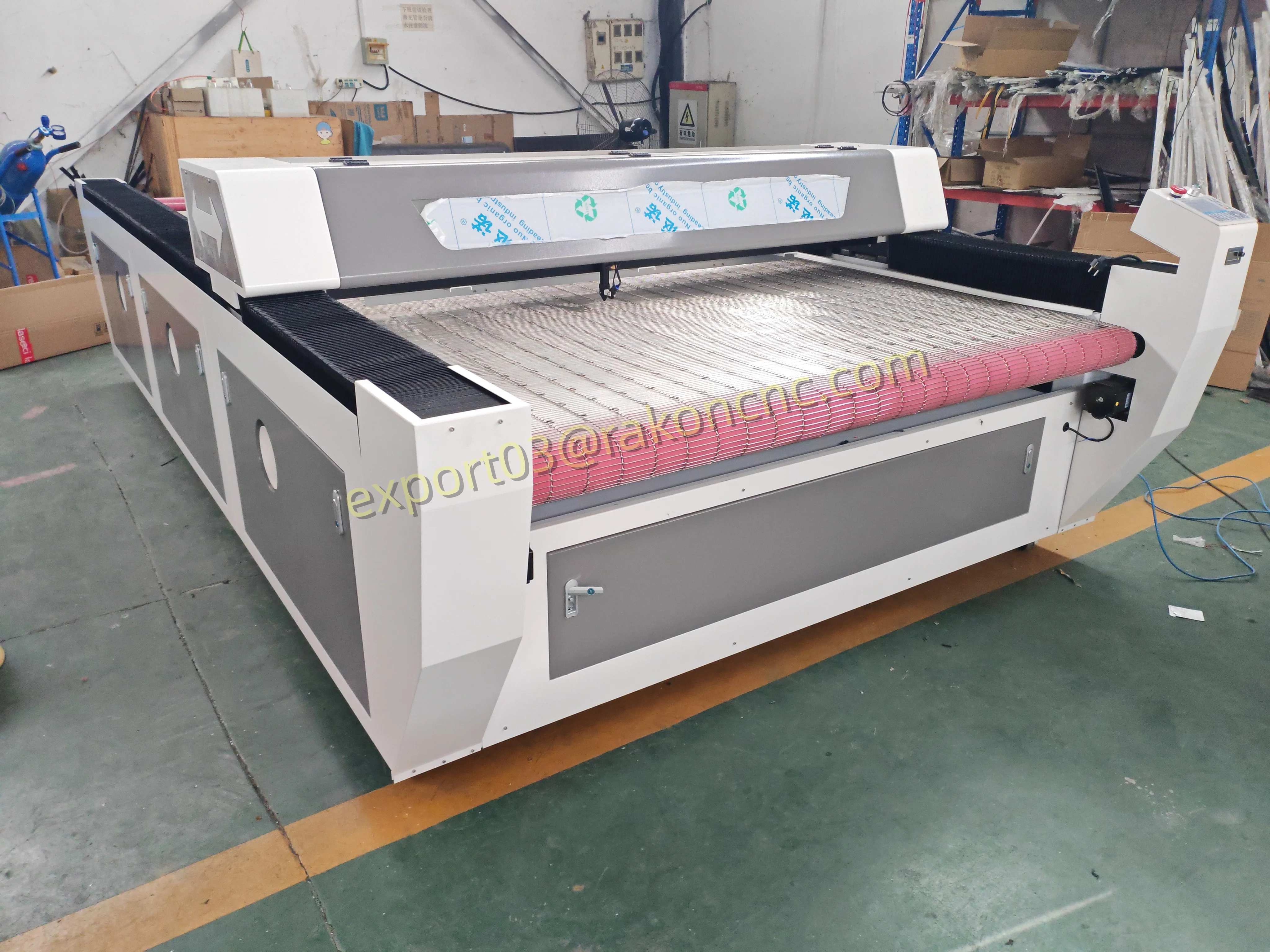 1610 que alimenta automáticamente la cortadora 100w 150w del laser del CO2 para la estera de cuero de la tela