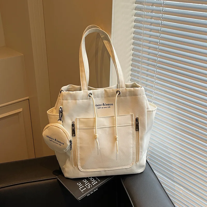 

Women's Canvas Bag Large Capacity2025New Summer Versatile Casual Shoulder Bag for College Students Commuting Tote Bag