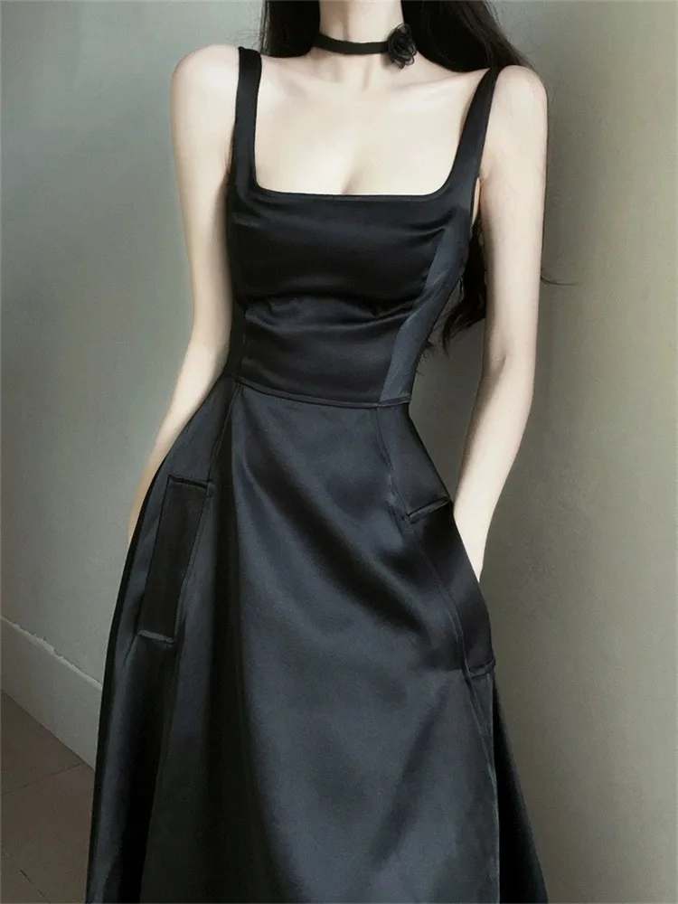 B-033 Falda larga 2025 Nuevo vestido de tirantes de estilo occidental con encanto exquisito estilo hermana de vacaciones junto al mar