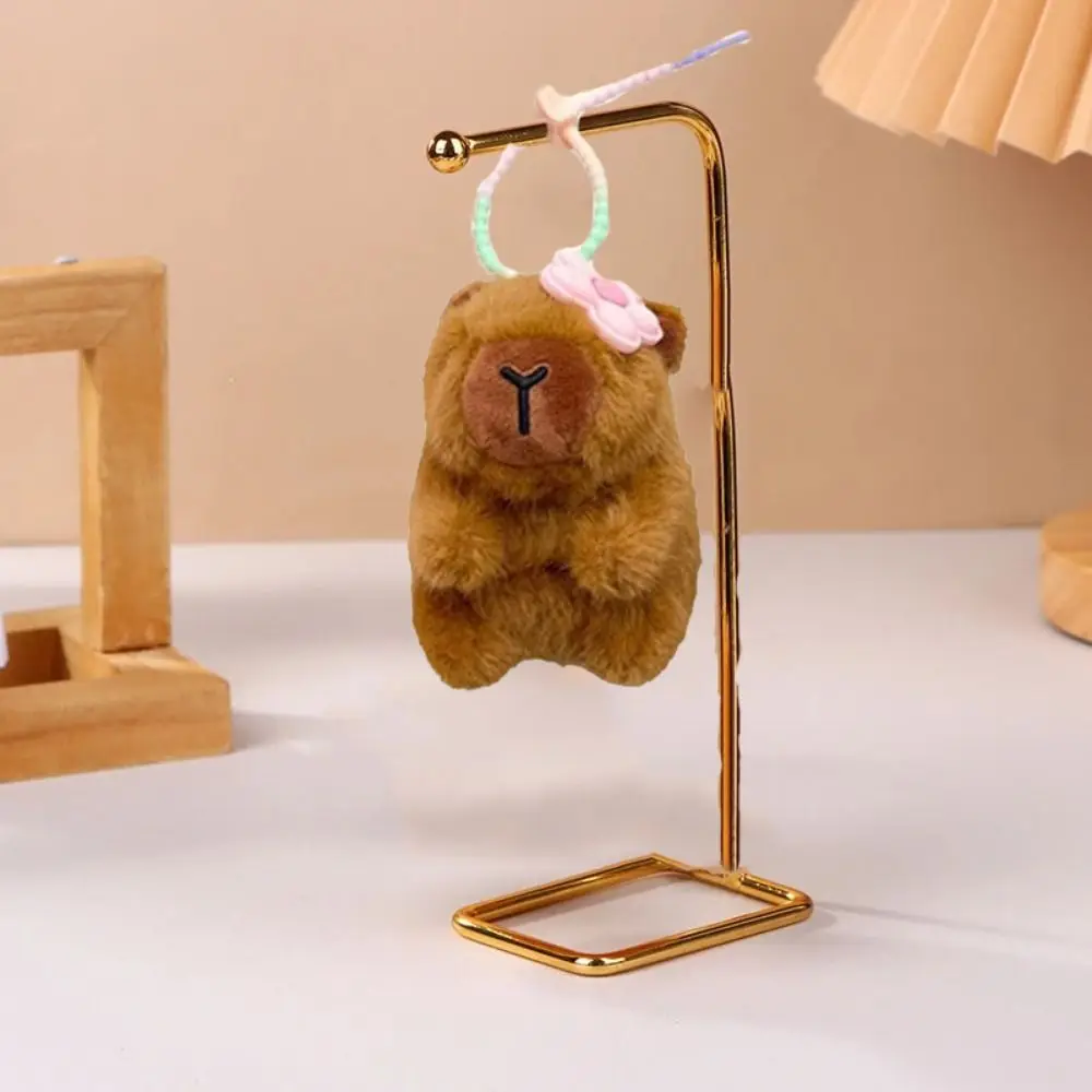 Muñeco de peluche capibara colgante de felpa pequeña flor lindo llavero de capibara de peluche divertido llavero de muñeco de peluche capibara de 10cm