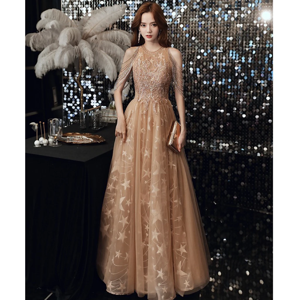 

Sexy Halter Celebrity Dress Champagne Stars Luxury O Neck Bead Tassel Appliques A-Line Long Women Backless Formal Evening Gowns