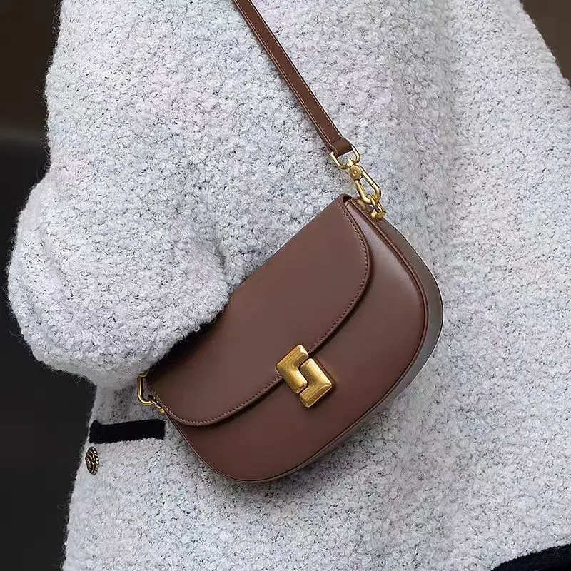 Bolso de mujer con diseño de nicho, bolso cuadrado pequeño de piel de vaca de capa superior, bolso de tofu de textura premium, bolso cruzado de un solo hombro