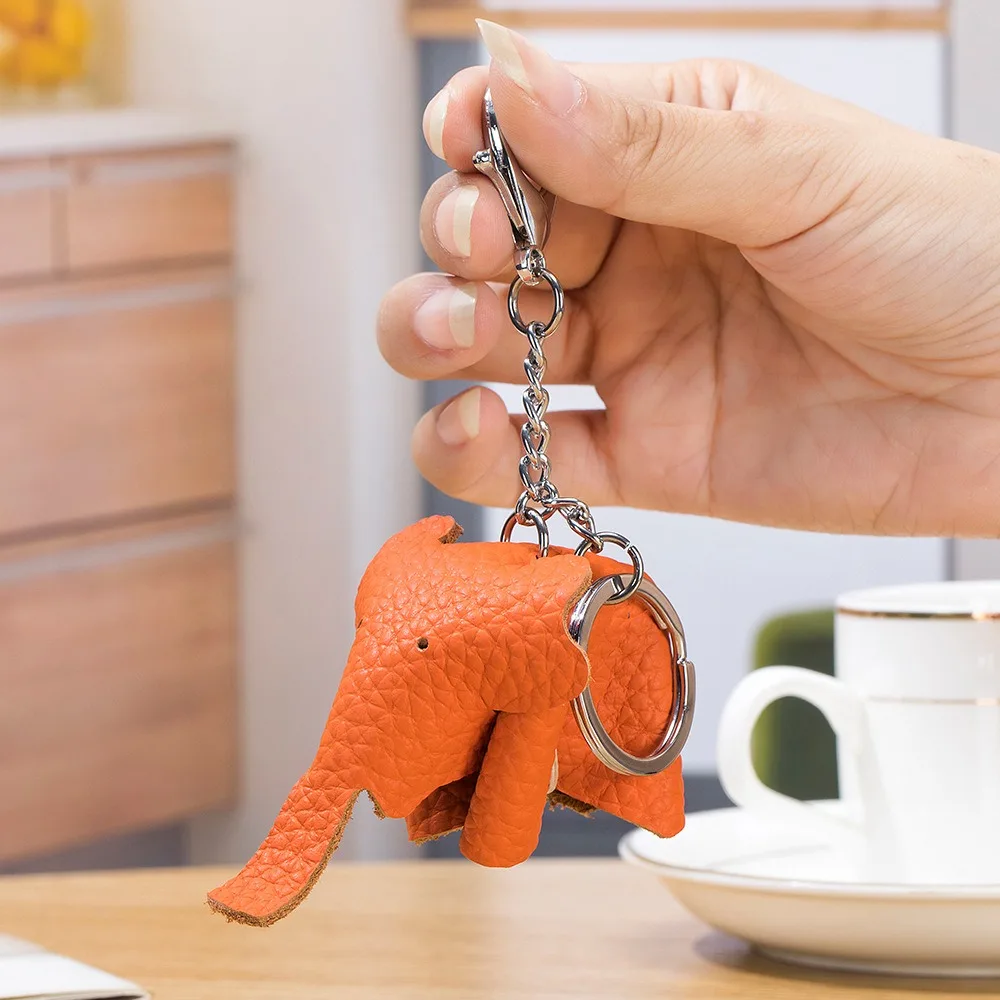 การ์ตูนของแท้หนัง Lucky Elephant พวงกุญแจของขวัญหลายรูปแบบ Key CHAIN ทําด้วยมือ DIY กระเป๋าเป้สะพายหลังอุปกรณ์เสริมกระเป๋า