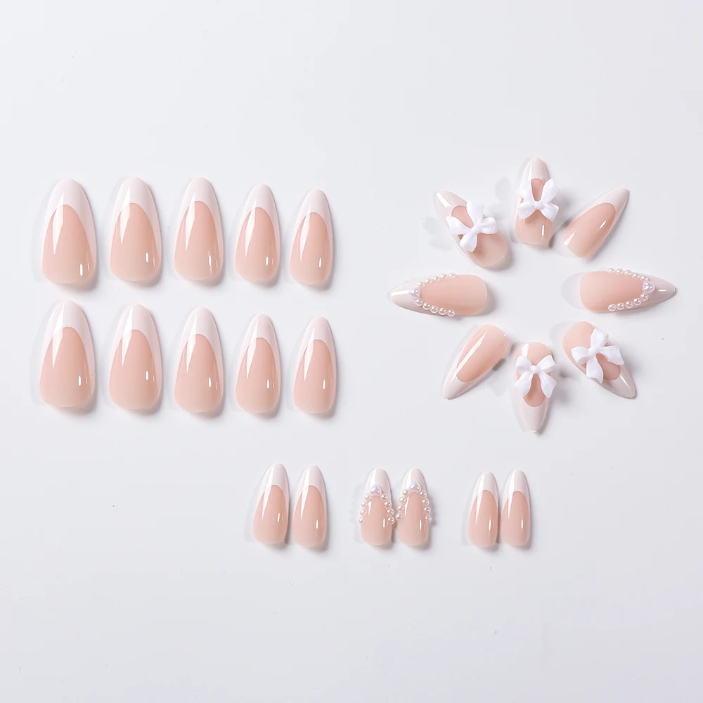 24PCS Medium White Pearl กดบนเล็บอัลมอนด์/Stiletto สีชมพู Bowknot ปลายนิ้วภาษาฝรั่งเศสคําน่ารักเล็บปลอมเต็มเล็บปลอมชุด