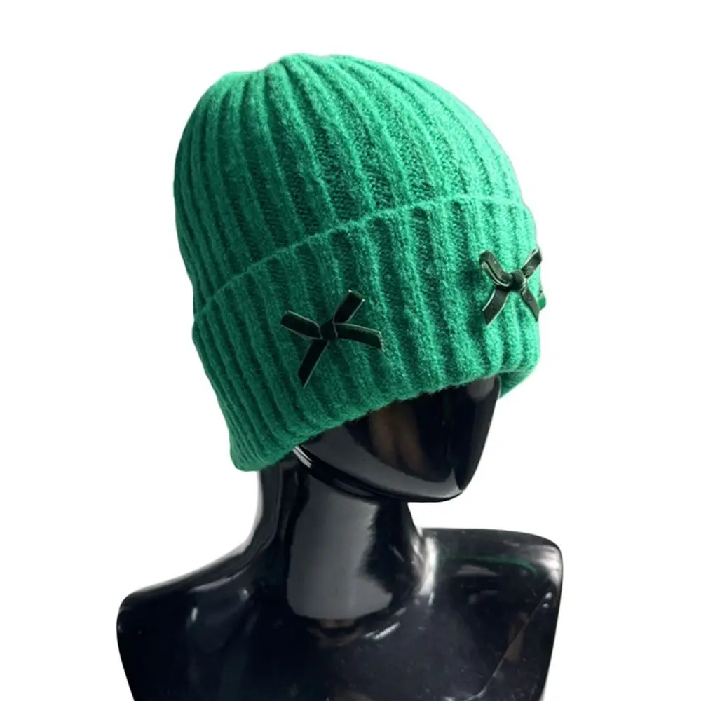 قبعة شتوية محبوكة بفيونكة سميكة وناعمة قبعة صغيرة كاجوال لطيفة للأذنين للنساء