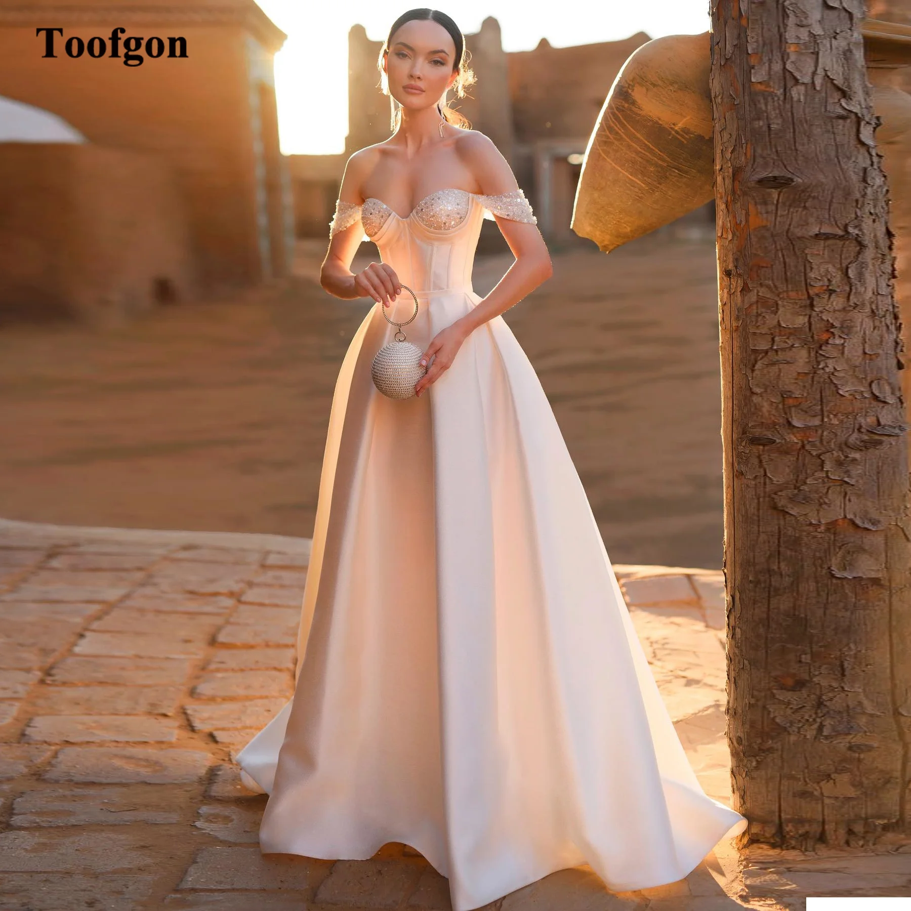 

Toofgon A Line Satin Wedding Dresses Sequin Off The Shoulder Corset Back Formal Party Bride Dress Sweep Train Bridal Gowns 2024