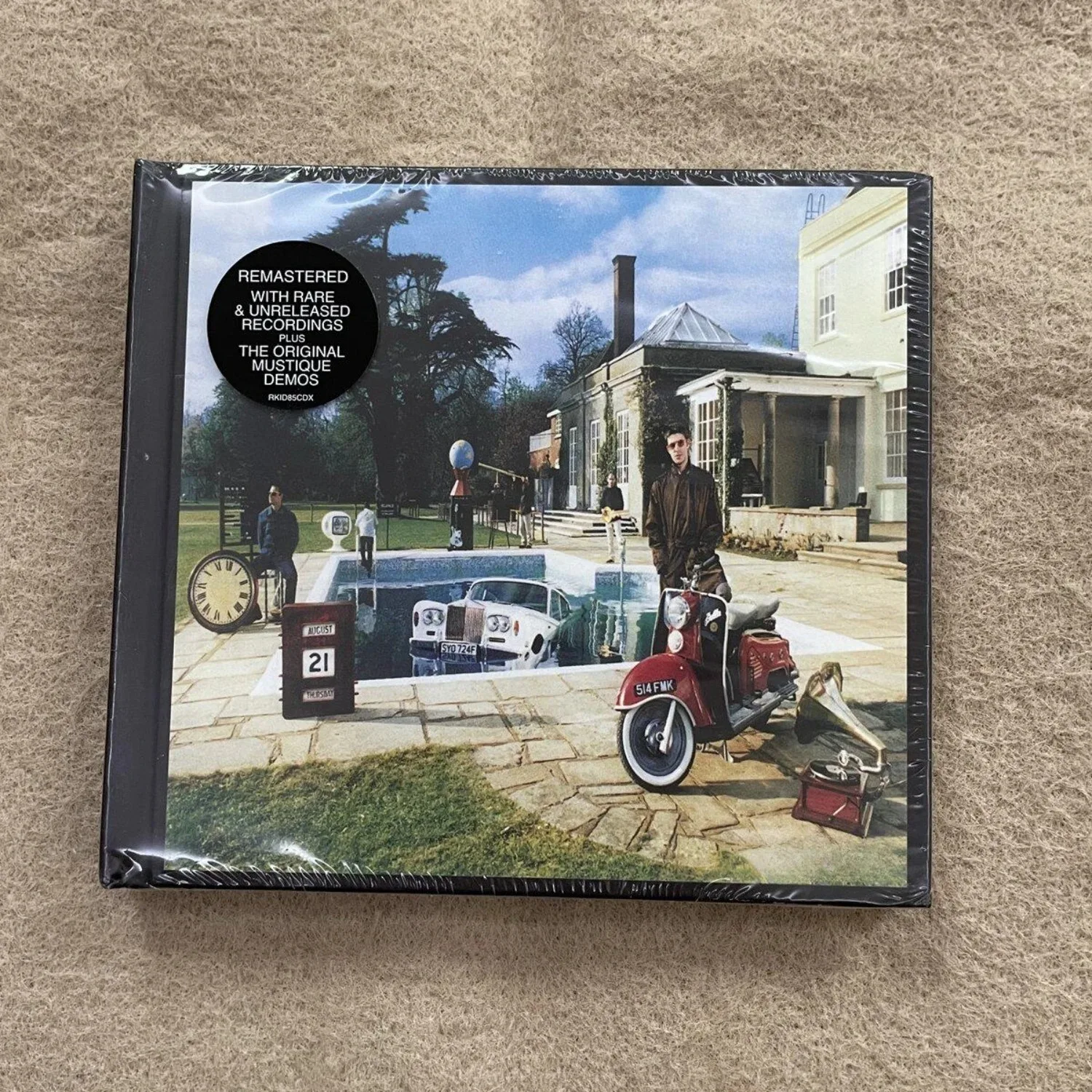Classic Britpop Remastered CD Album | Retro Courtyard Collage Art-Style Cover, Original Recordings and Bonus Tracks Edition