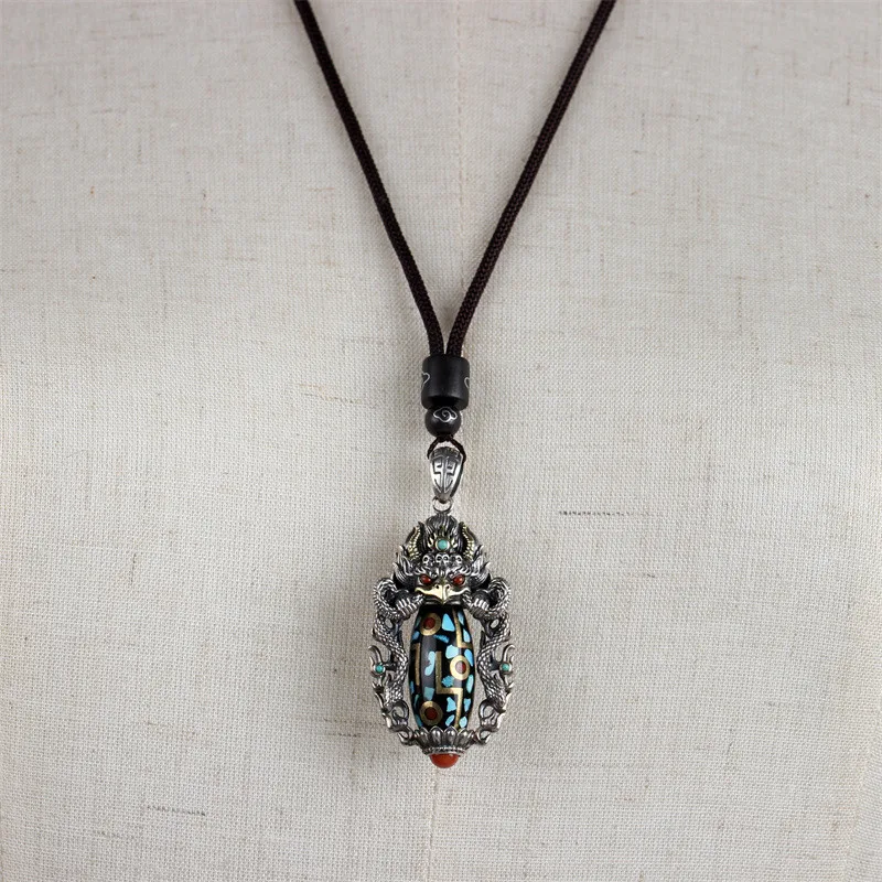 New high-end boutique handmade retro Dapeng Golden Winged Bird national style personalized necklace pendant unisex hand-woven
