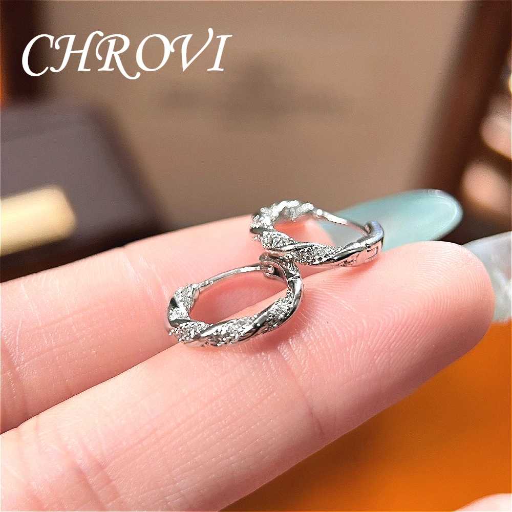 New 925 pure silver minimalist stud earrings featuring round diamonds, with a unique small and exclusive ear loop design.