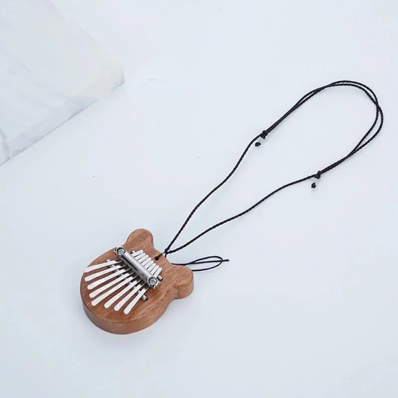 Mini 8 Key Solid Wood Kalimba With Portable Lanyard And Crisp Sound Perfect For Music Beginners Kids Casual Play Travel Gift