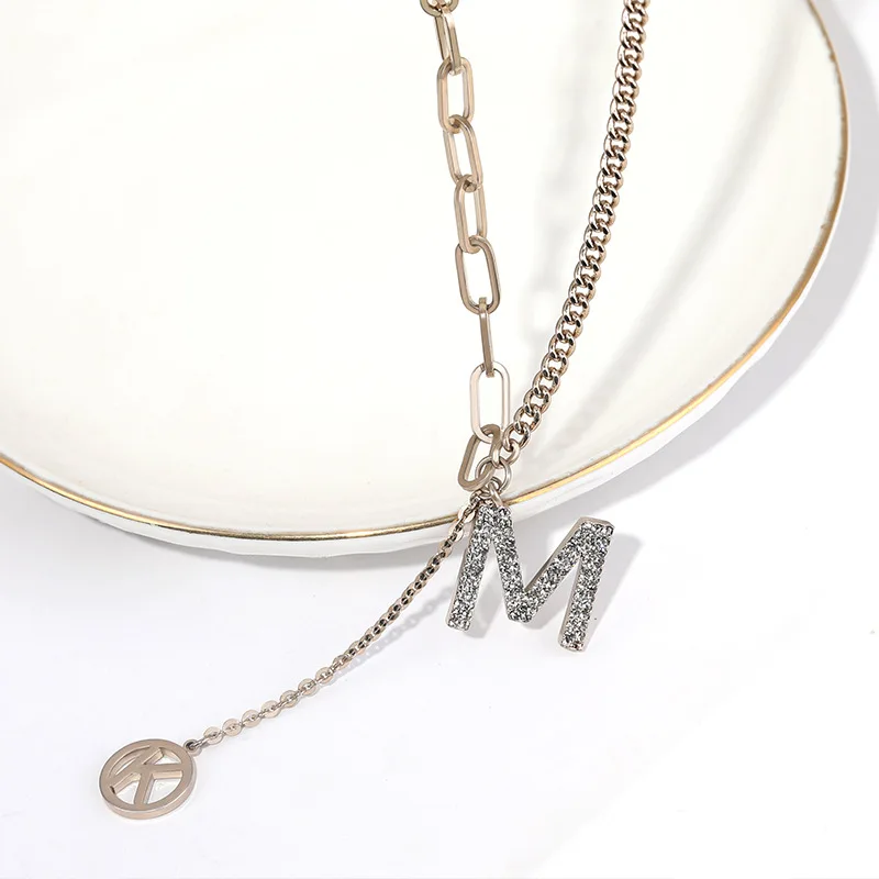 

2025 Stylish and versatile MK tassel short sweater chain High-end necklace for casual wear