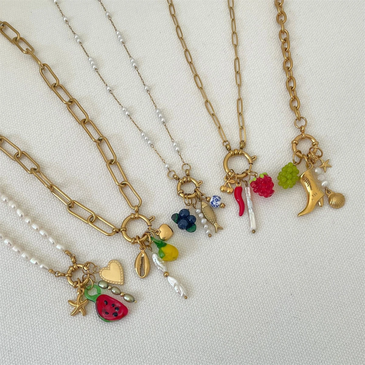 

Stainless steel fruit heart boots ins high-end feeling collarbone chain pearl starfish gold-plated color preservation