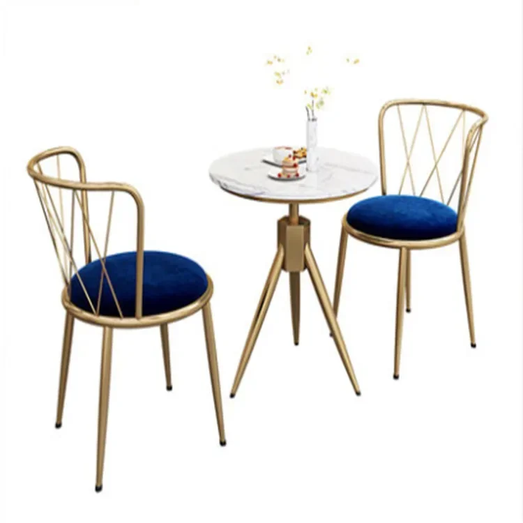 

2026 Wholesale pink velvet fabric chair with gold legs and round table with marble top coffee shop furniture chairs and tables