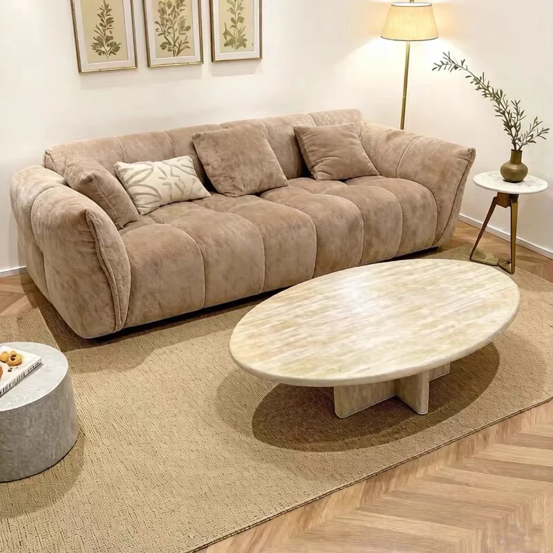 Light luxury white travertine oval coffee table modern minimalist style, suitable for hotel living rooms, villas