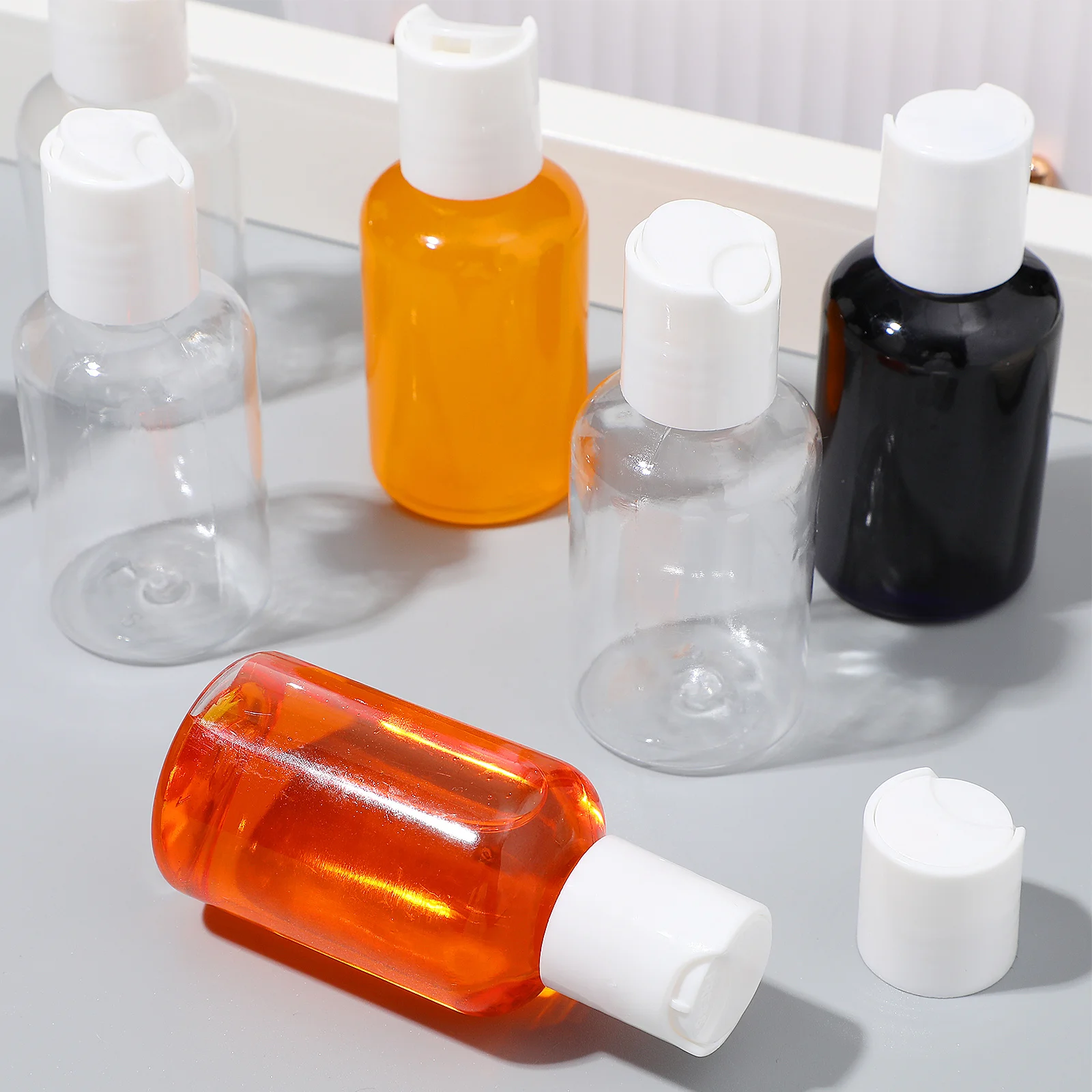 12 個千秋キャップ詰め替えトラベルボトル収納容器シャンプーローション洗顔クリームトラベルサイズトイレタリー