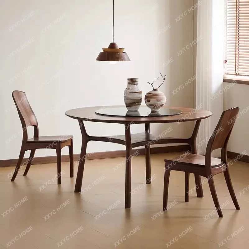 

A Black walnut round dining table Modern light luxury household turntable round table