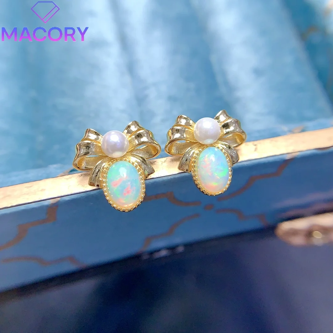 Female natural opal earrings silver 925 tremella nail female rose gold high-grade jewelry exquisite jewelry gems.